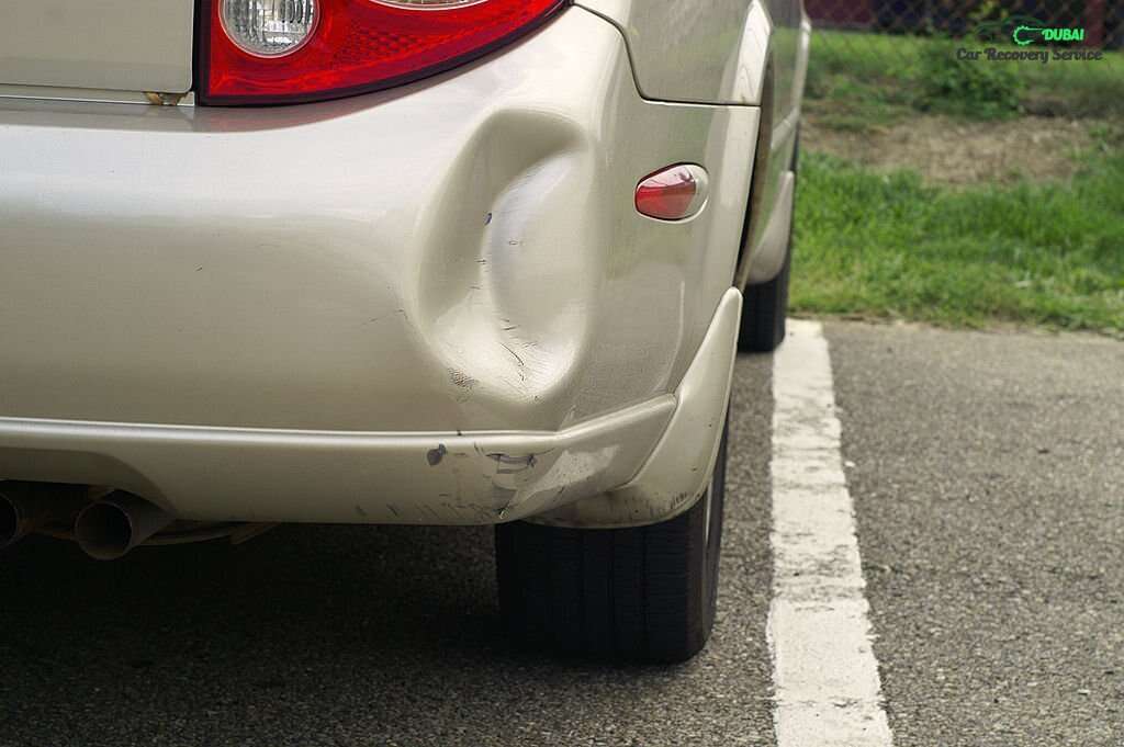 bumper dent on car